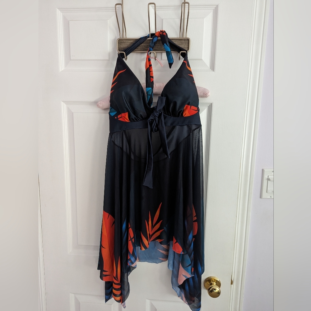Bathing suit top with breathable flowing cover up.